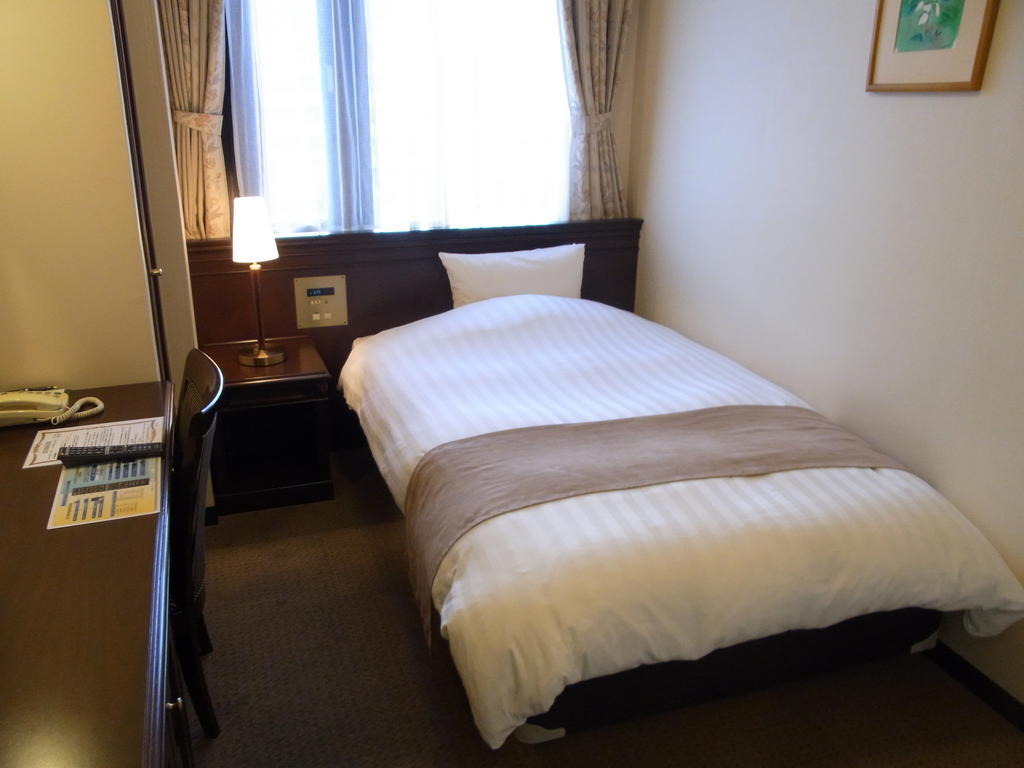 Amami Sunplaza Hotel Camera foto