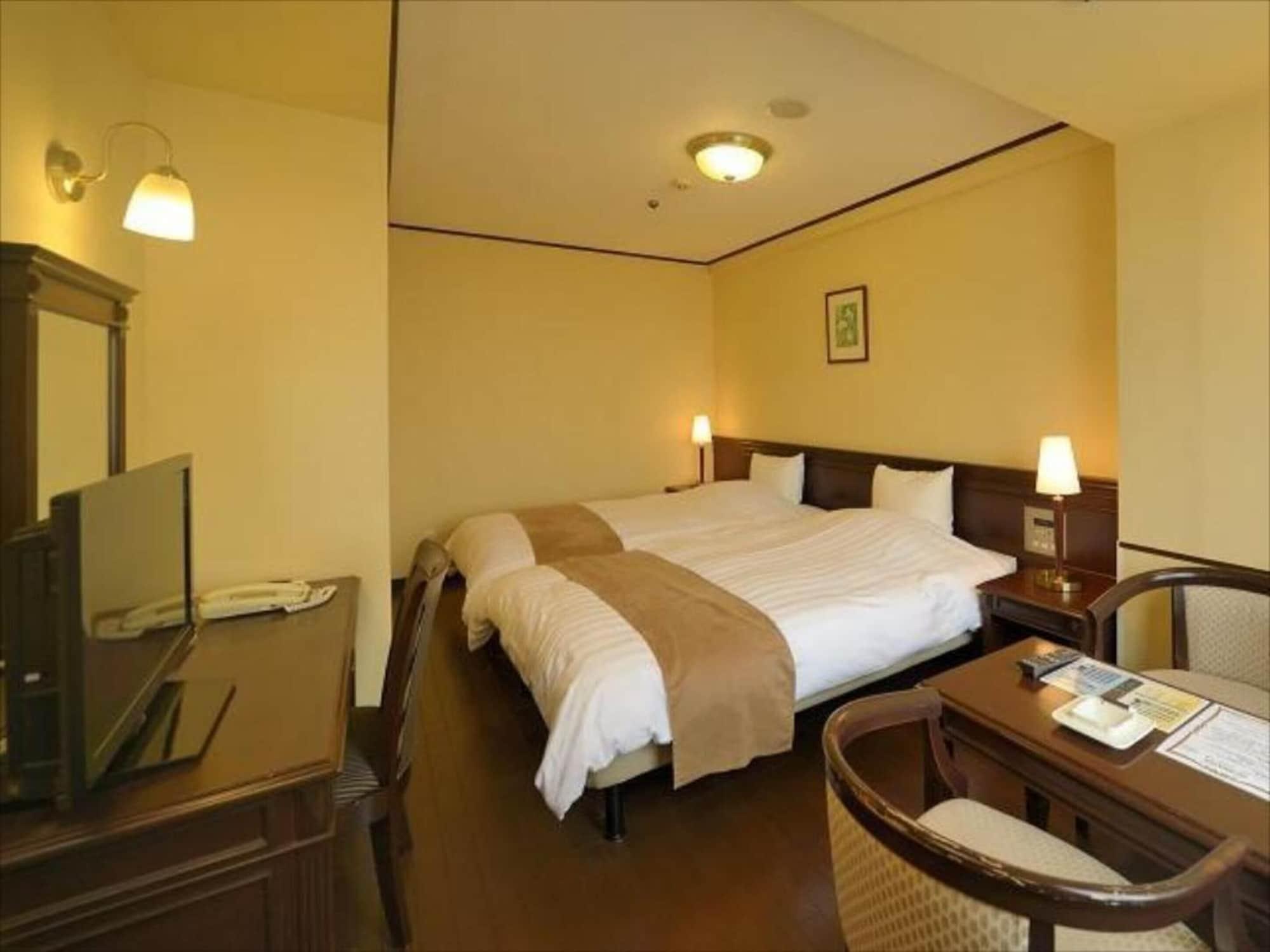 Amami Sunplaza Hotel Esterno foto
