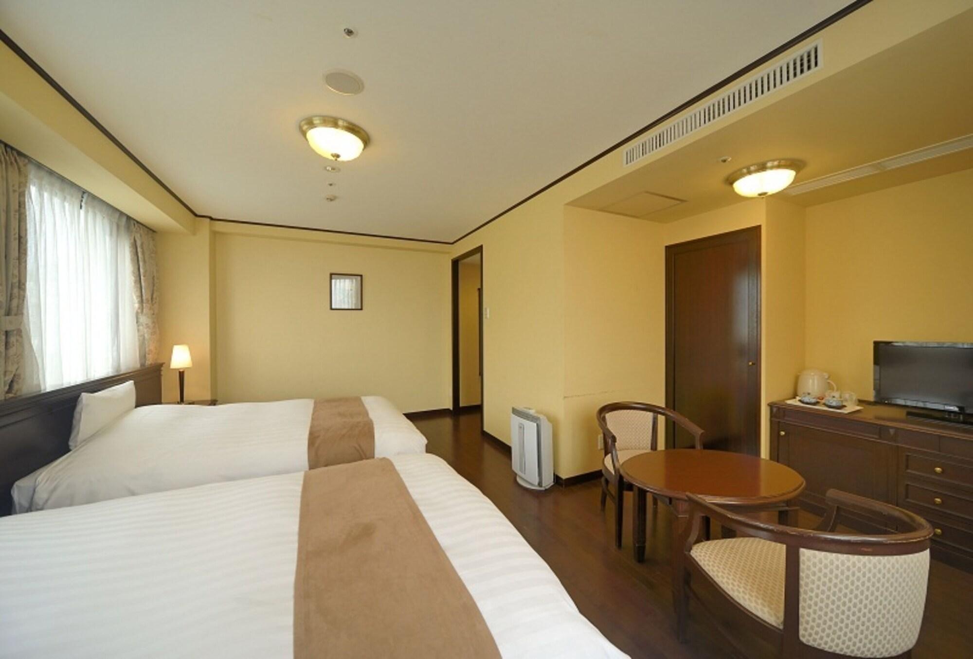 Amami Sunplaza Hotel Esterno foto