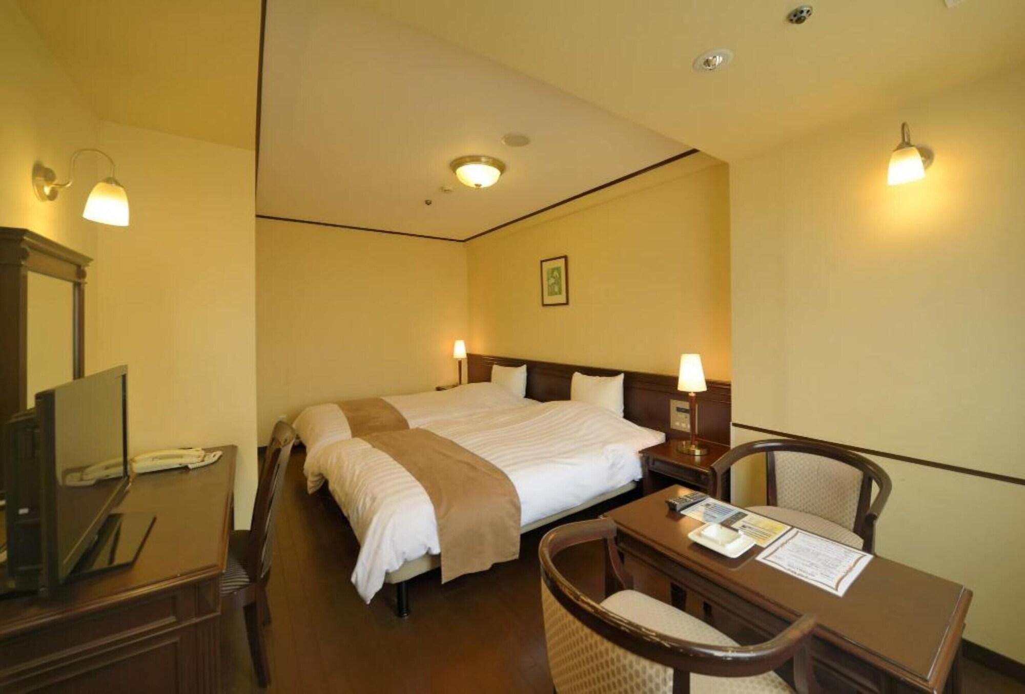 Amami Sunplaza Hotel Esterno foto
