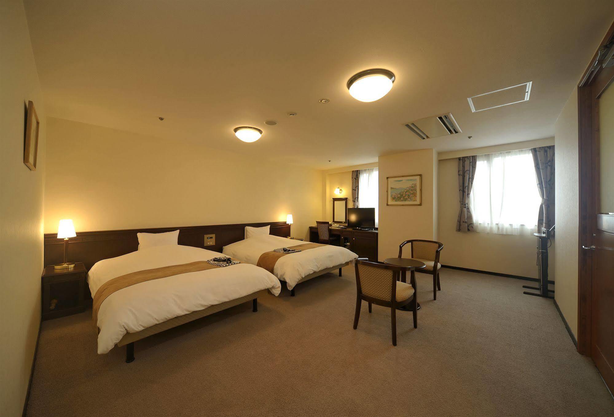 Amami Sunplaza Hotel Esterno foto