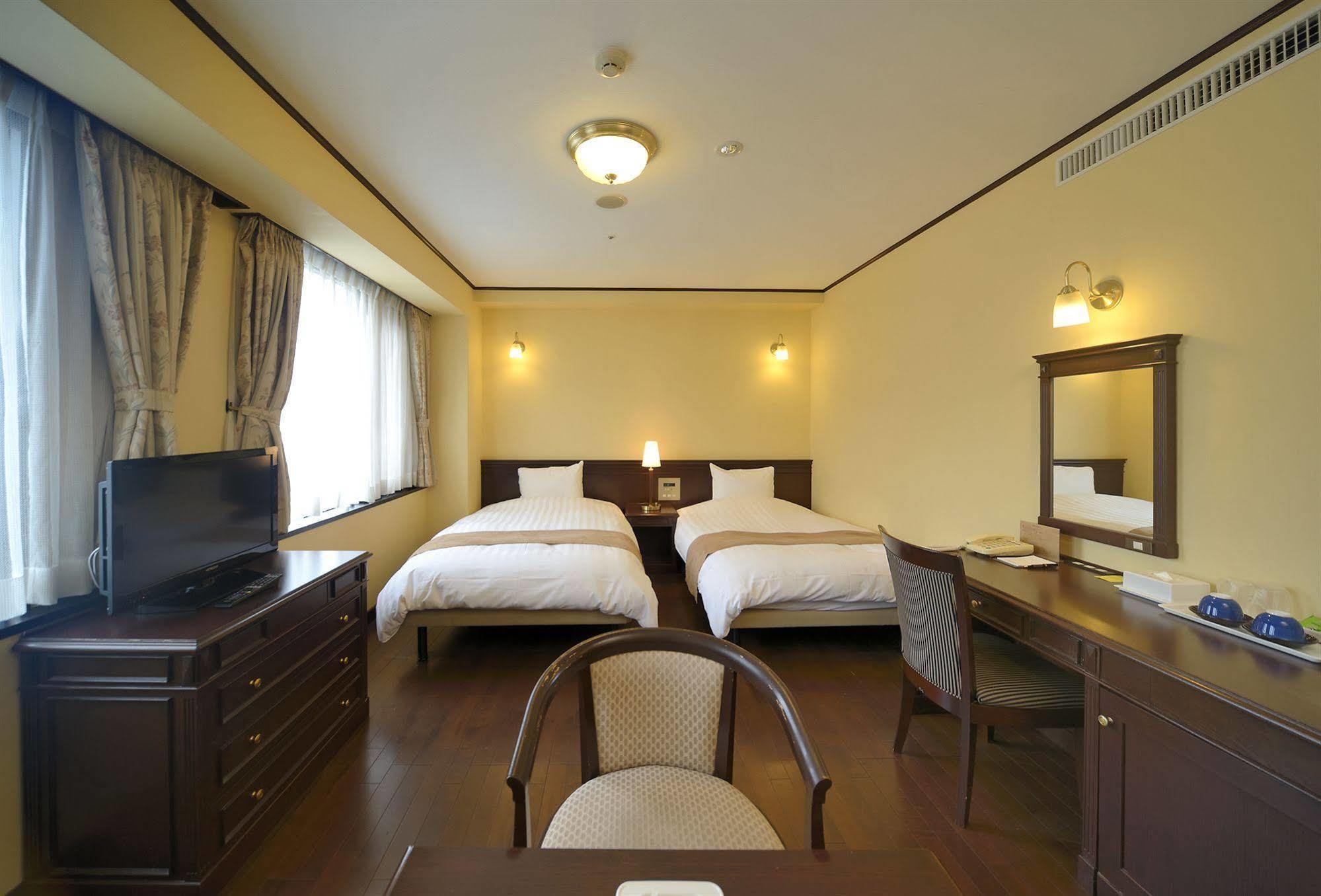 Amami Sunplaza Hotel Esterno foto