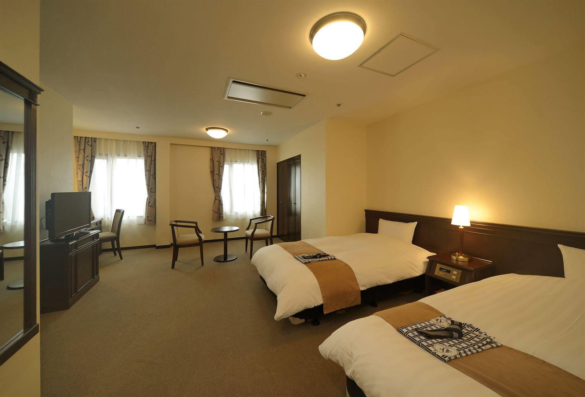 Amami Sunplaza Hotel Esterno foto