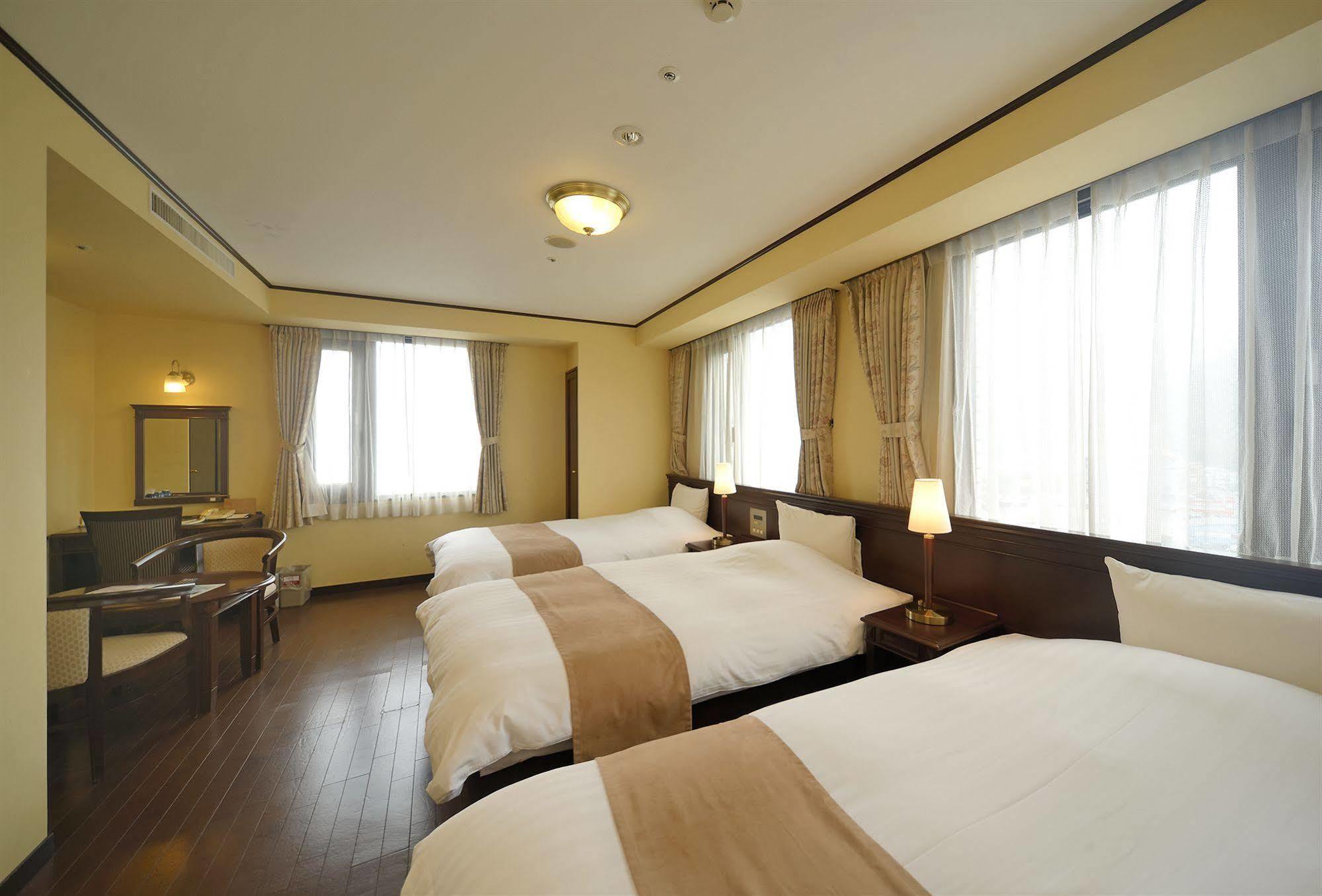 Amami Sunplaza Hotel Esterno foto