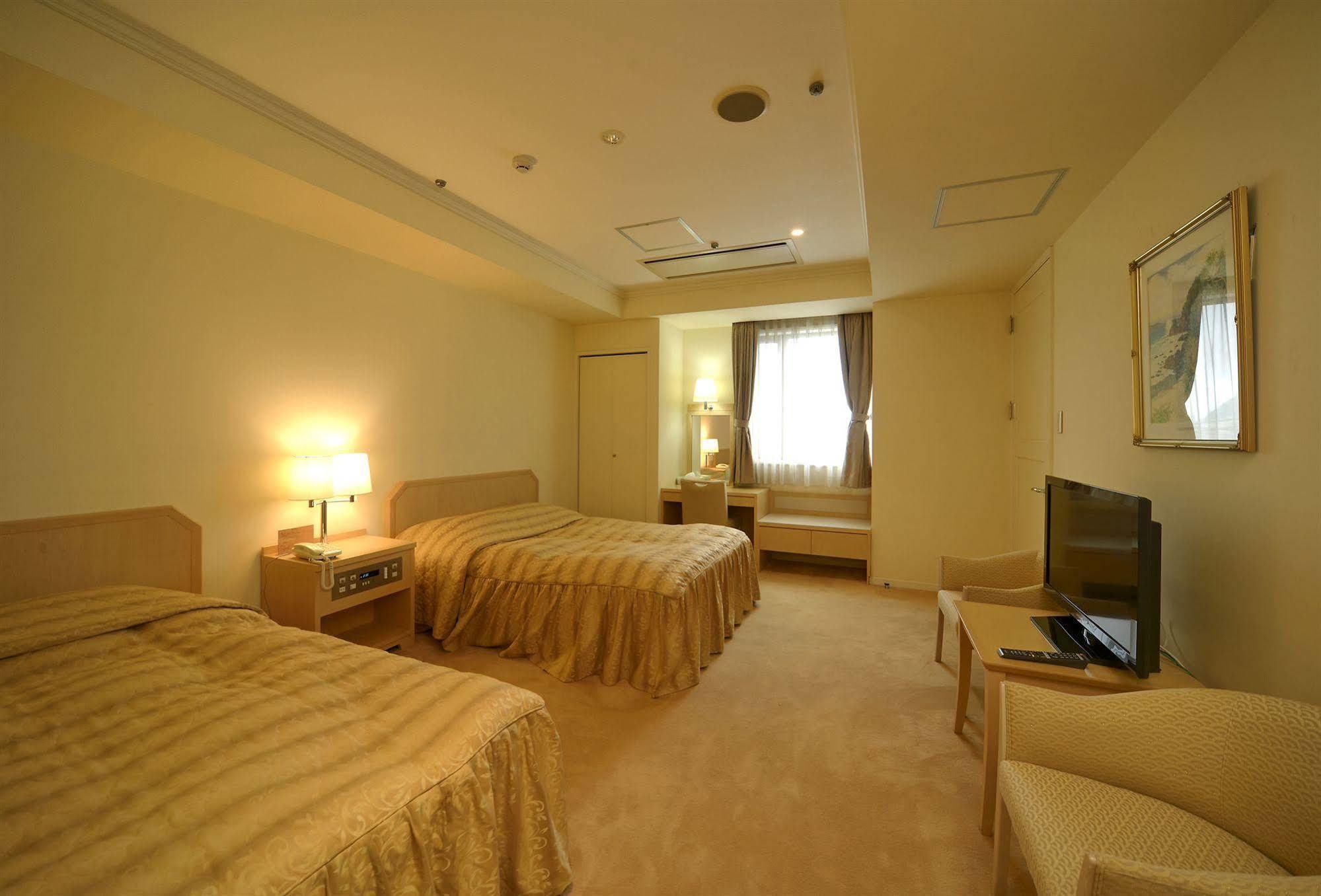 Amami Sunplaza Hotel Esterno foto